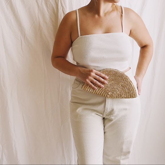 Urban Outfitters Handbags - Straw Half Moon Zip Clutch